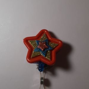 Retractable name badge holder